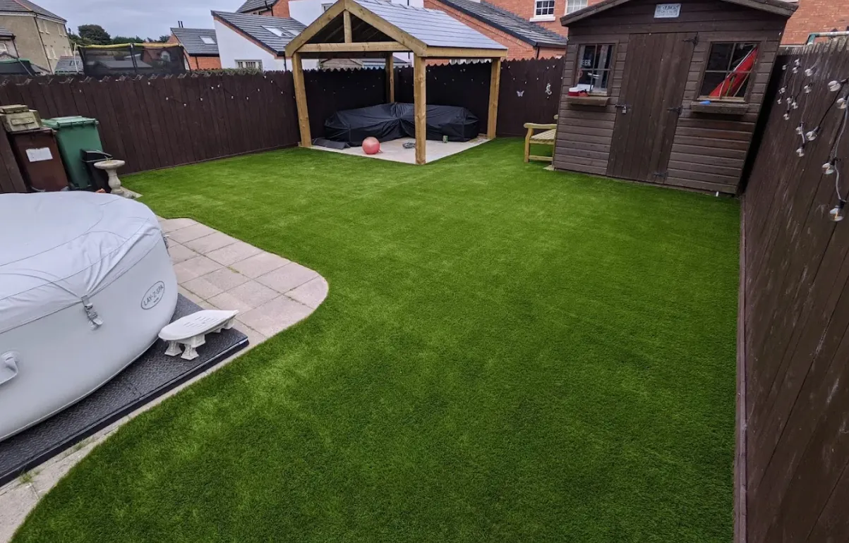 Artificial grass lawn completed by Farnborough Driveways & Patios